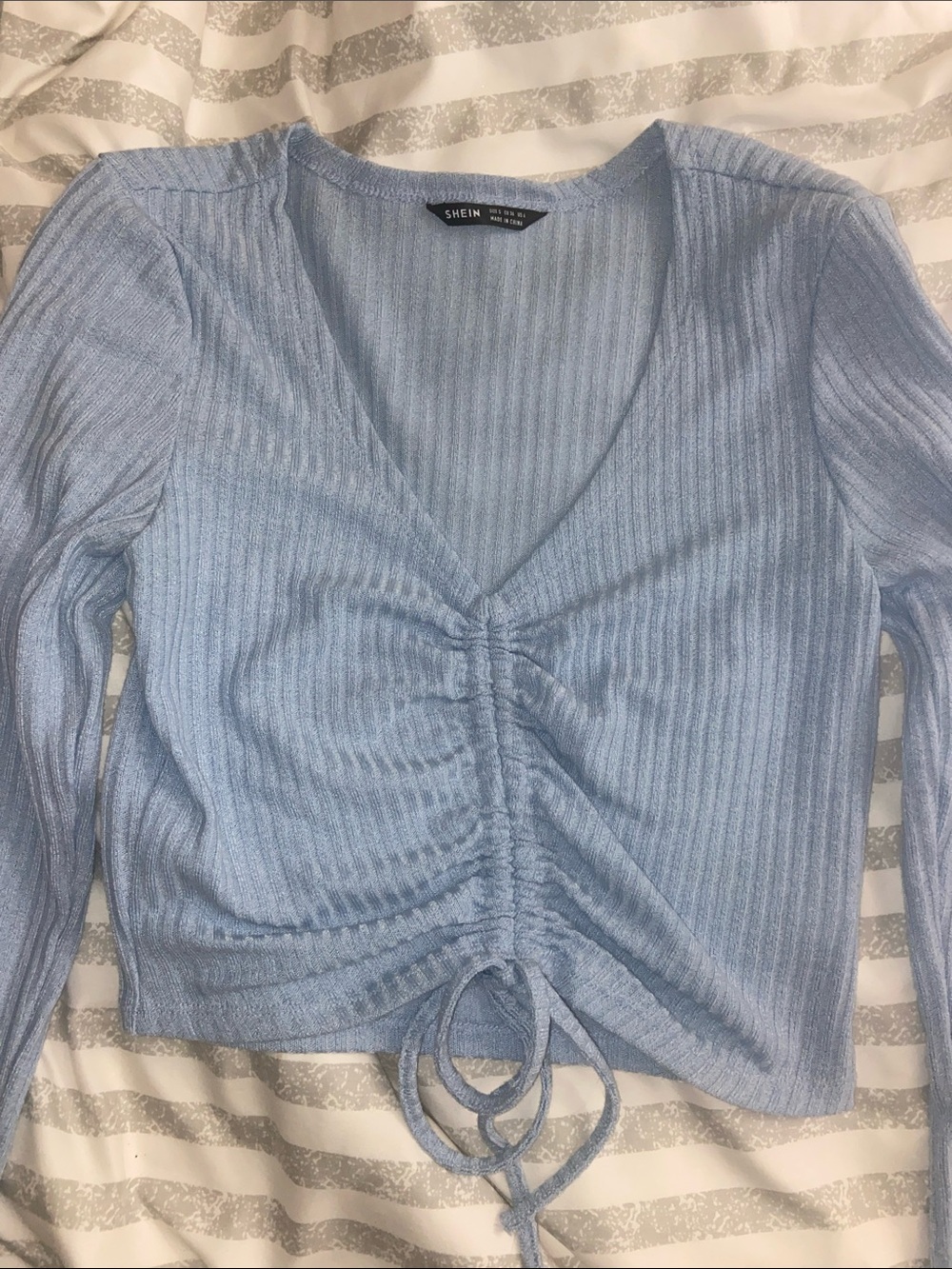 Light blue ribbed long sleeve top